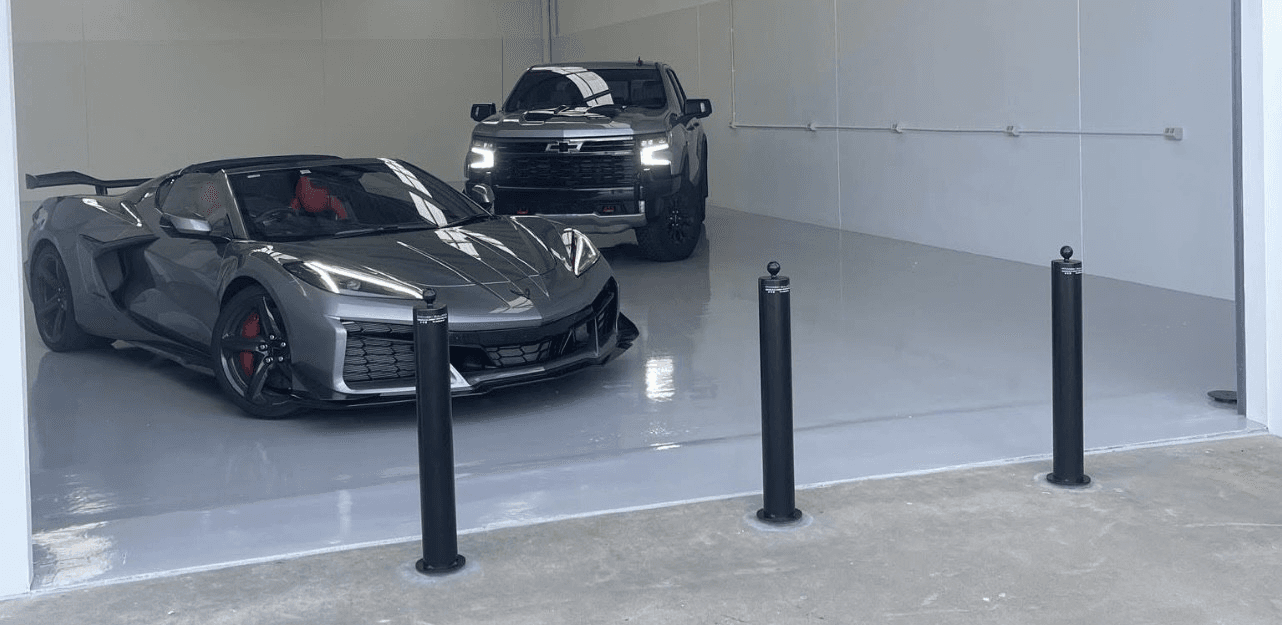 Bollard install protecting performance car